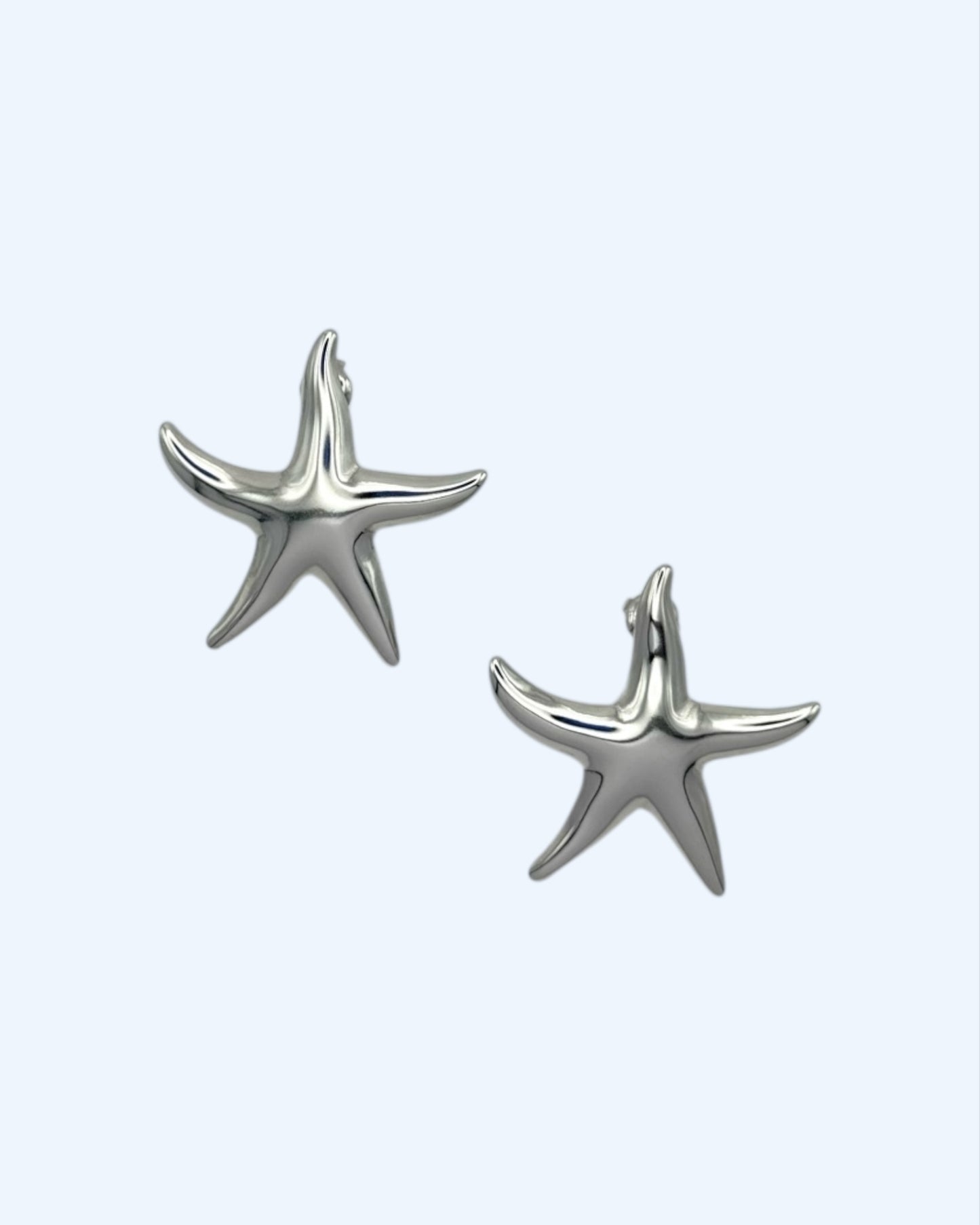 BRINCOS ESTRELA PRATEADOS EM AÇO INOXIDÁVEL