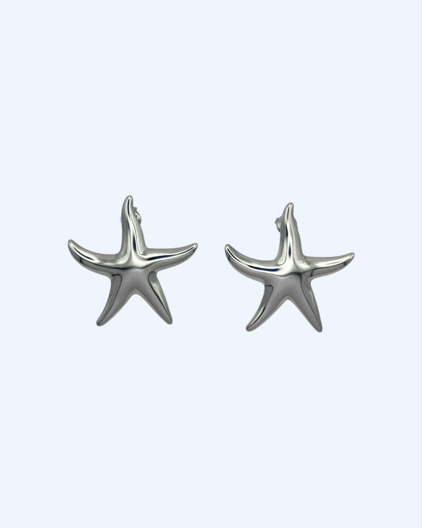 BRINCOS ESTRELA PRATEADOS EM AÇO INOXIDÁVEL