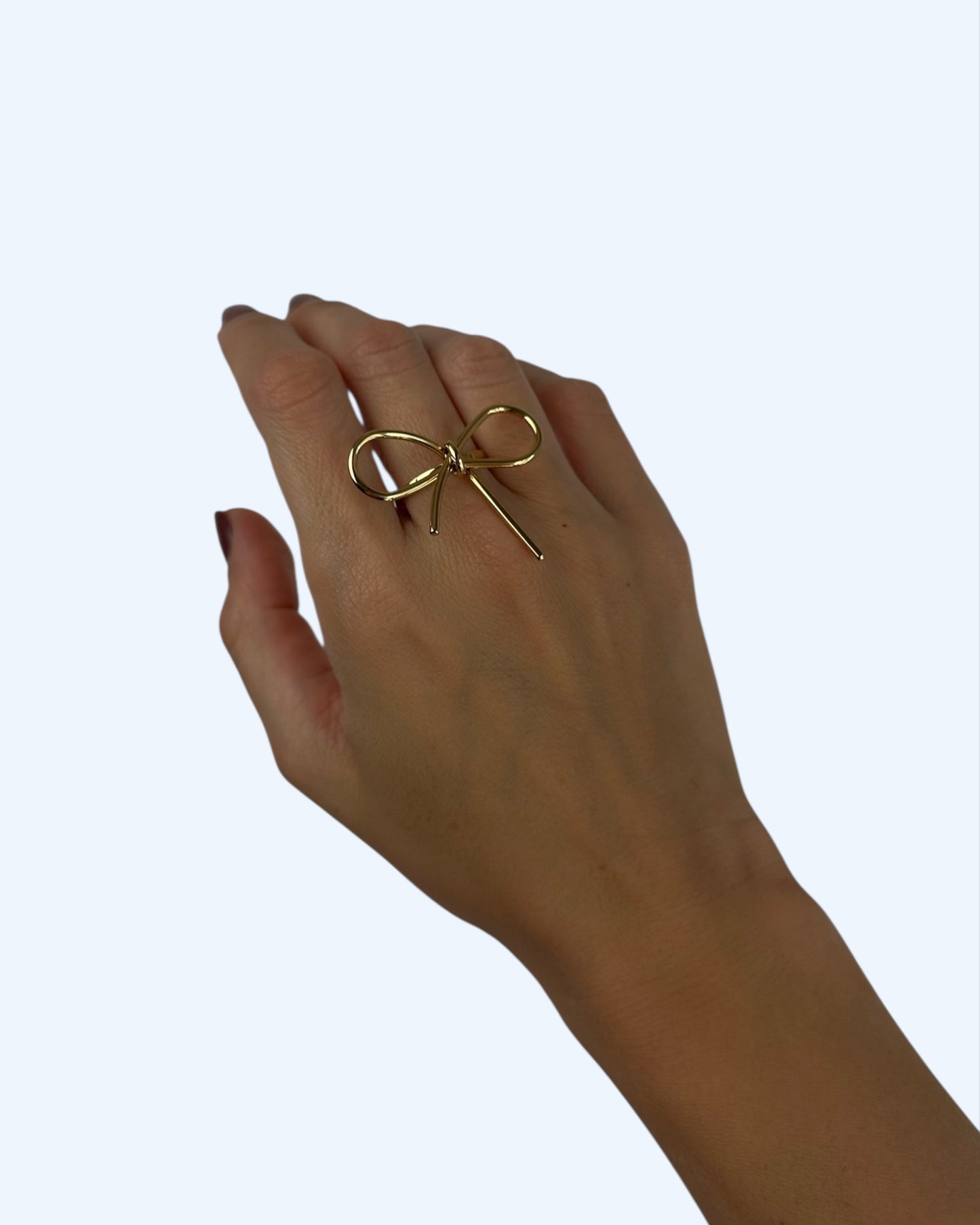 ANEL DOURADO COM LAÇO MINIMALISTA em aço inoxidável