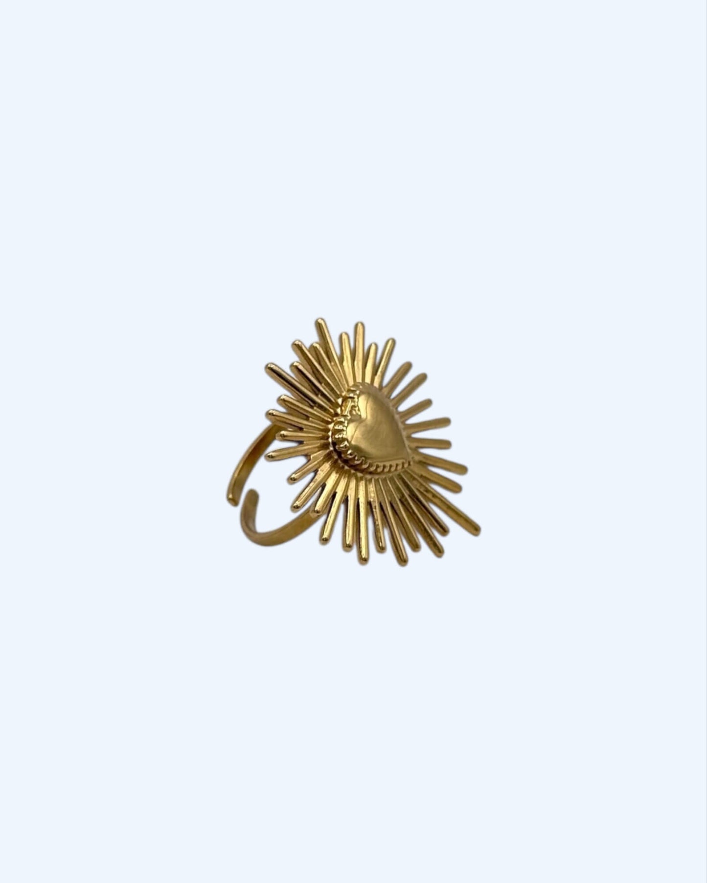 ANEL DOURADO COM CORAÇÃO RADIANTE em aço inoxidável
