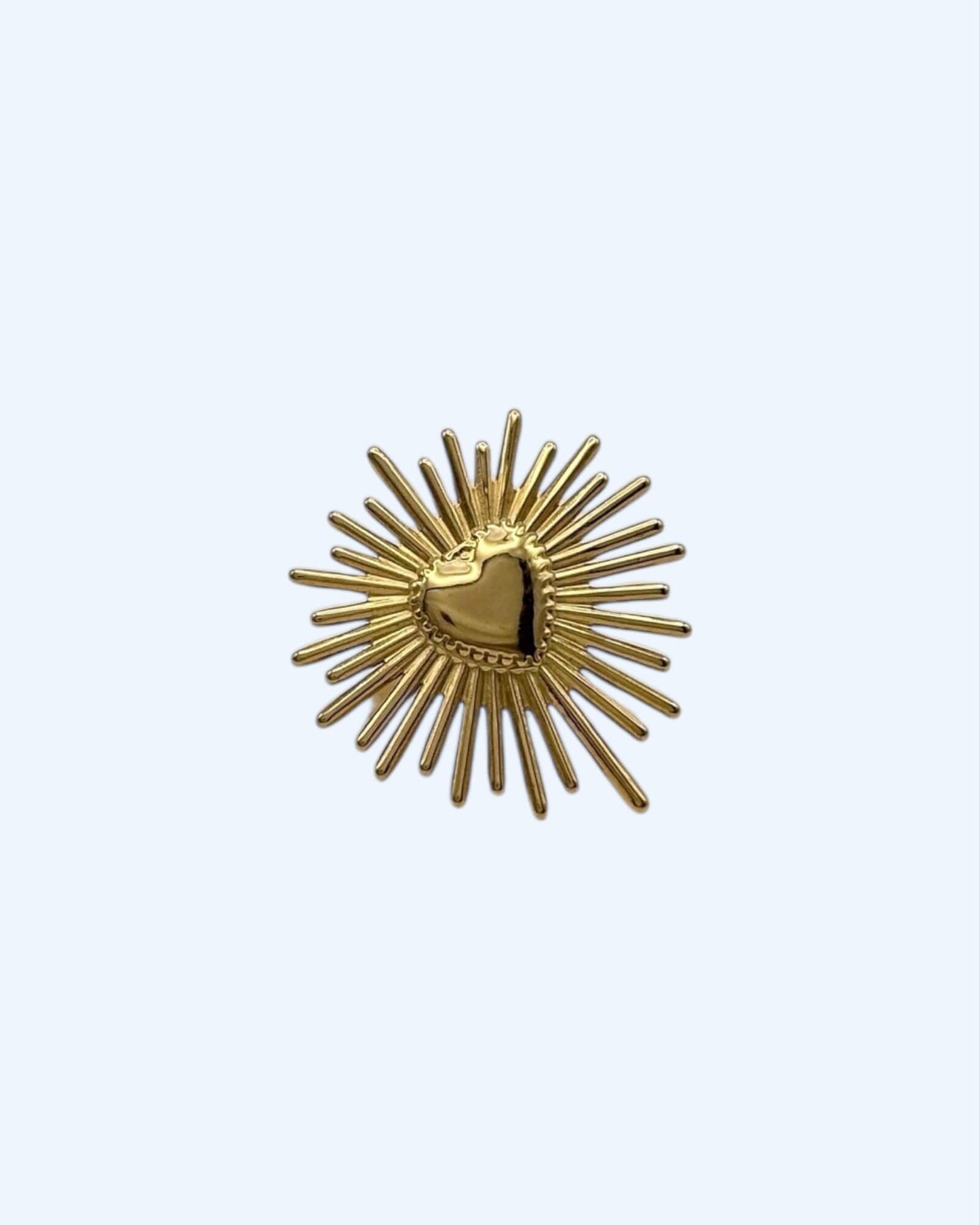 ANEL DOURADO COM CORAÇÃO RADIANTE em aço inoxidável