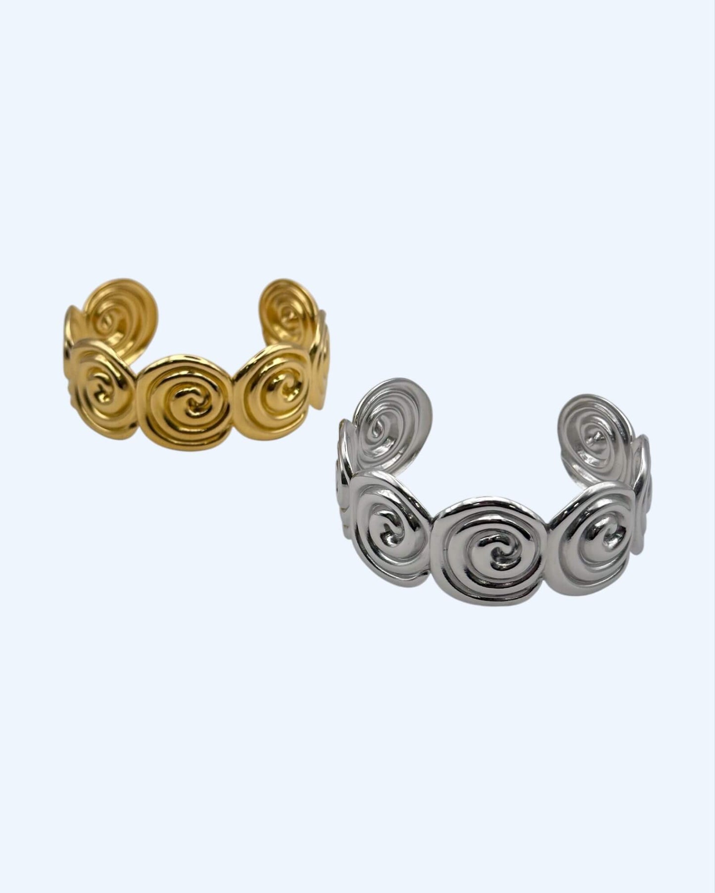 PULSEIRA RÍGIDA ESPIRAIS DOURADA OU PRATEADA EM AÇO