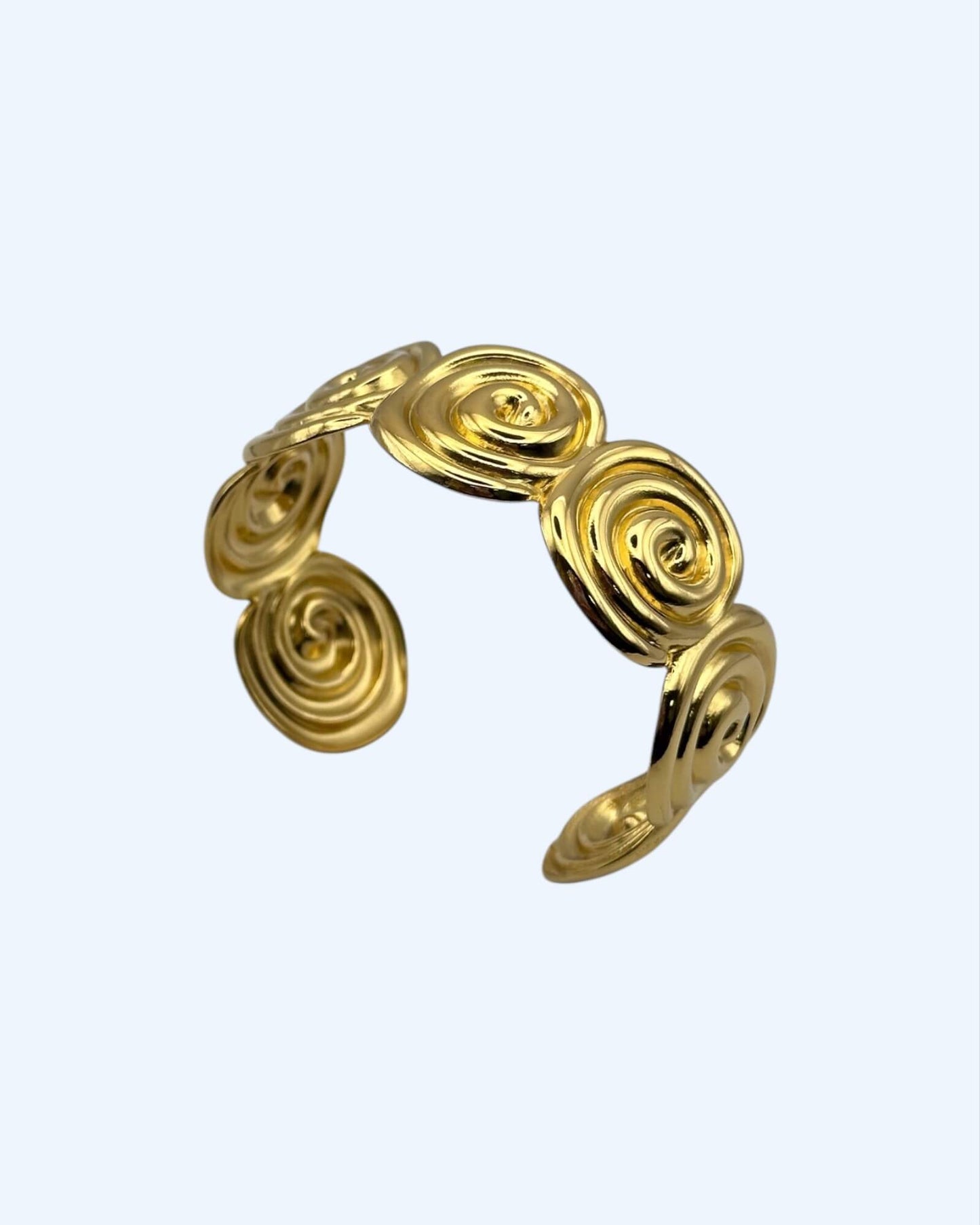 PULSEIRA RÍGIDA ESPIRAIS DOURADA OU PRATEADA EM AÇO