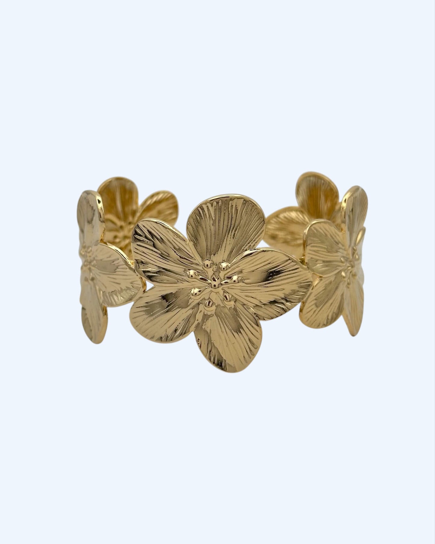 PULSEIRA RÍGIDA FLORES DOURADA OU PRATEADA EM AÇO