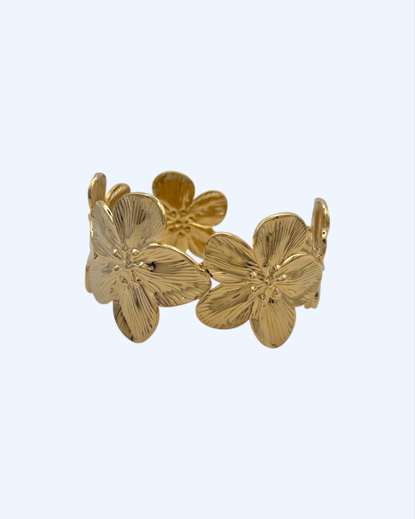 PULSEIRA RÍGIDA FLORES DOURADA OU PRATEADA EM AÇO
