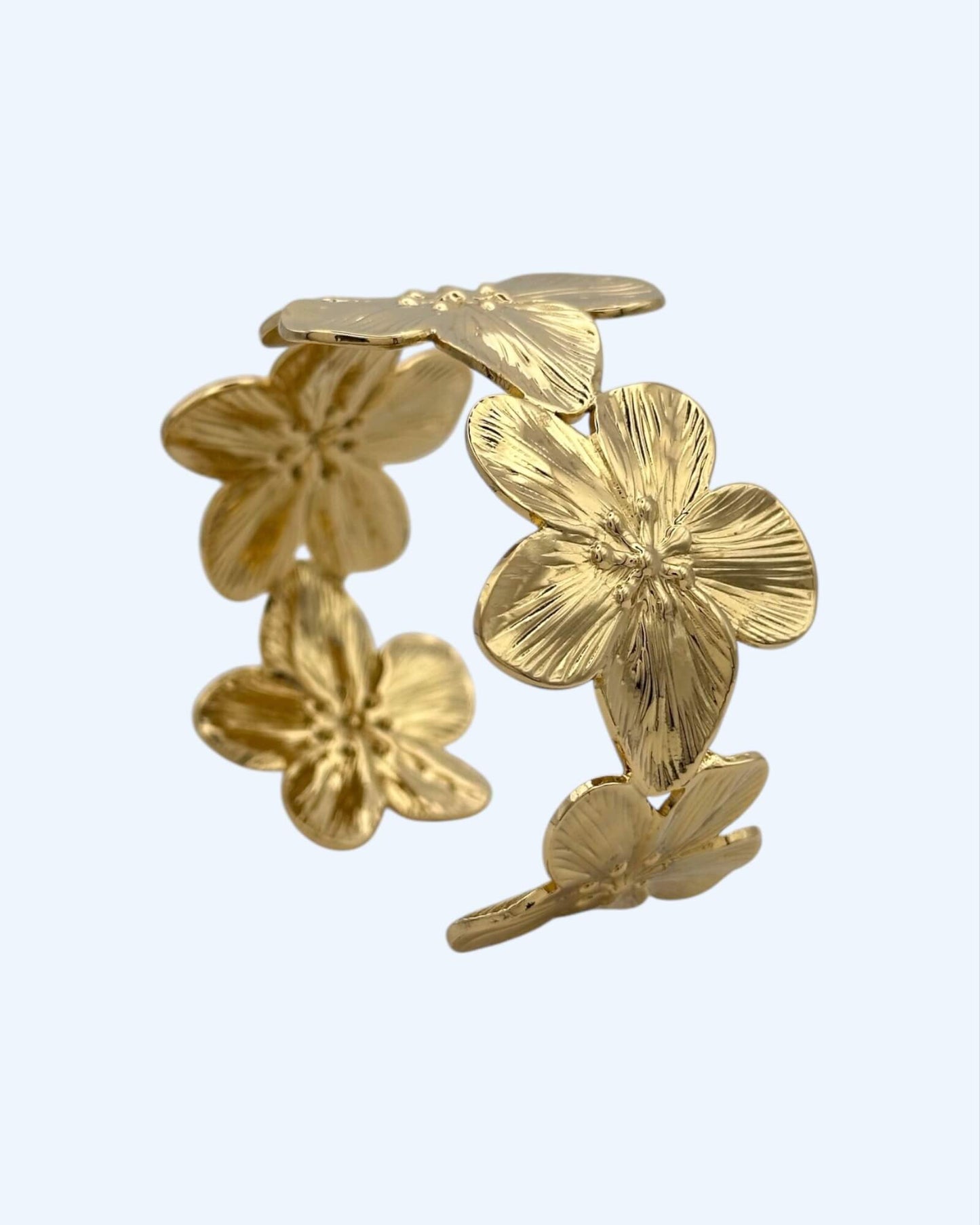 PULSEIRA RÍGIDA FLORES DOURADA OU PRATEADA EM AÇO