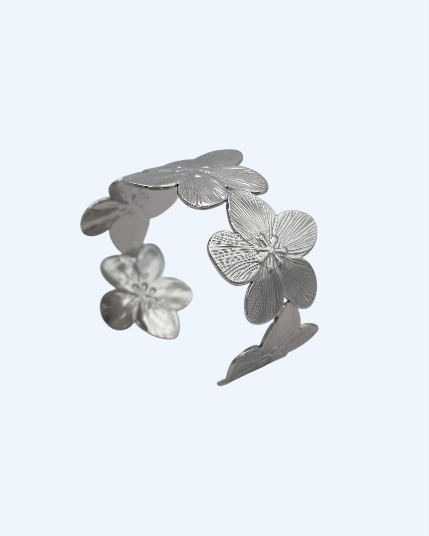 PULSEIRA RÍGIDA FLORES DOURADA OU PRATEADA EM AÇO