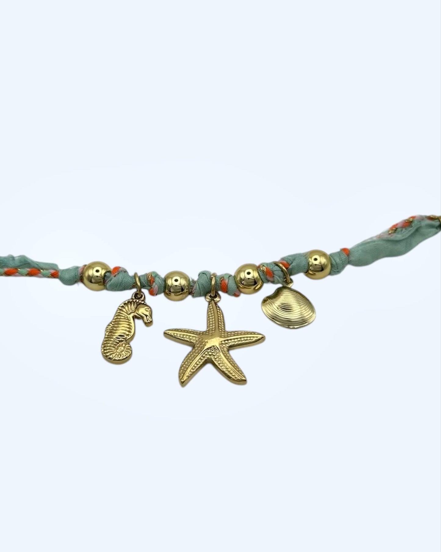 PULSEIRA COM PENDENTES MARINHOS em aço inoxidável