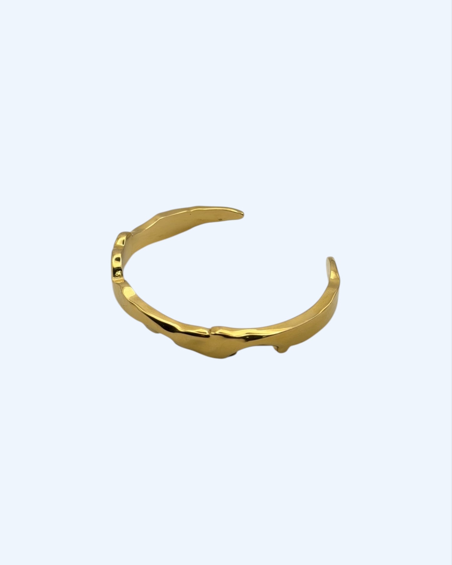 MIST - PULSEIRA RÍGIDA DOURADA COM RECORTES EM AÇO INOXIDÁVEL