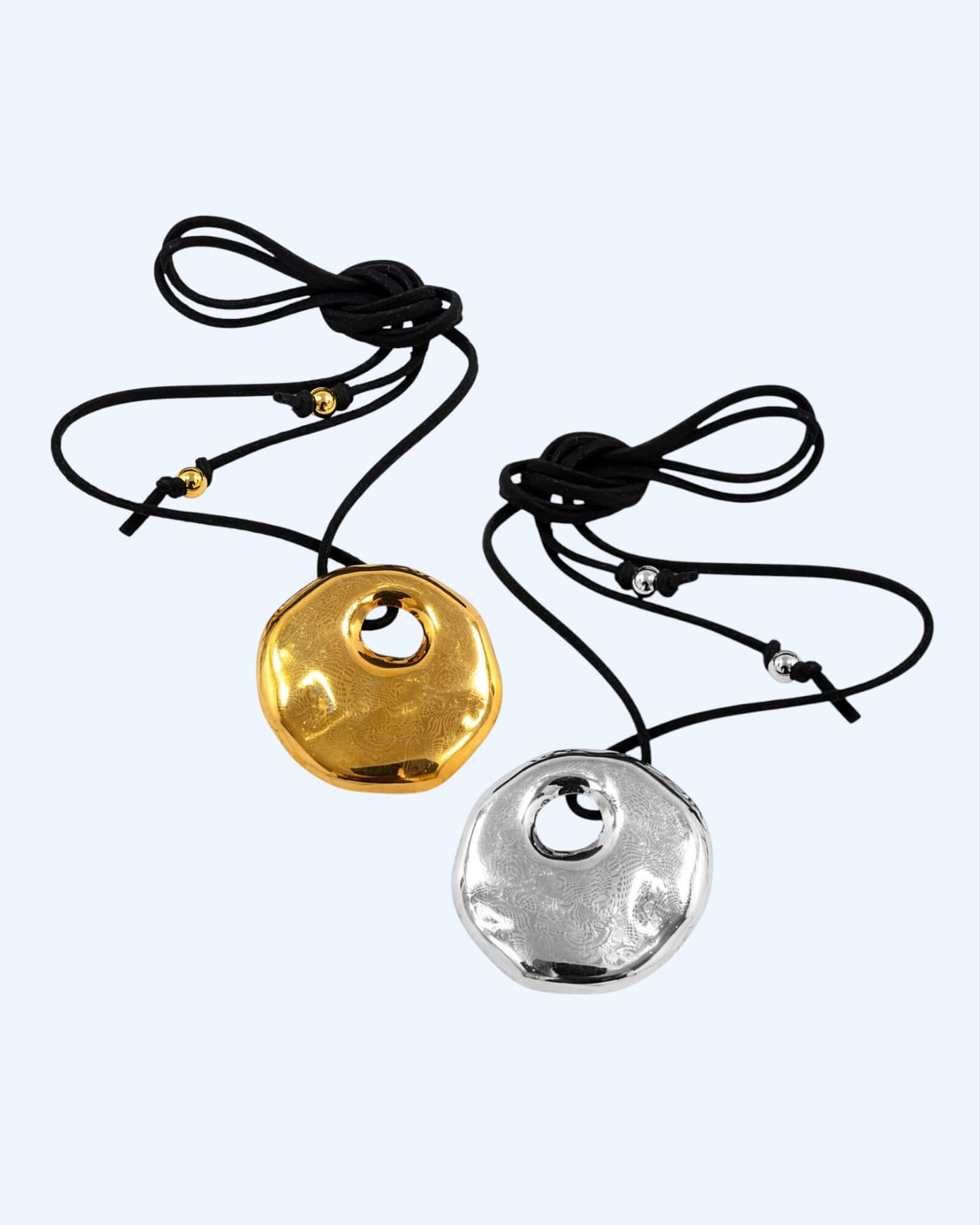 SUEDE NECKLACE WITH STAINLESS STEEL MEDALLION