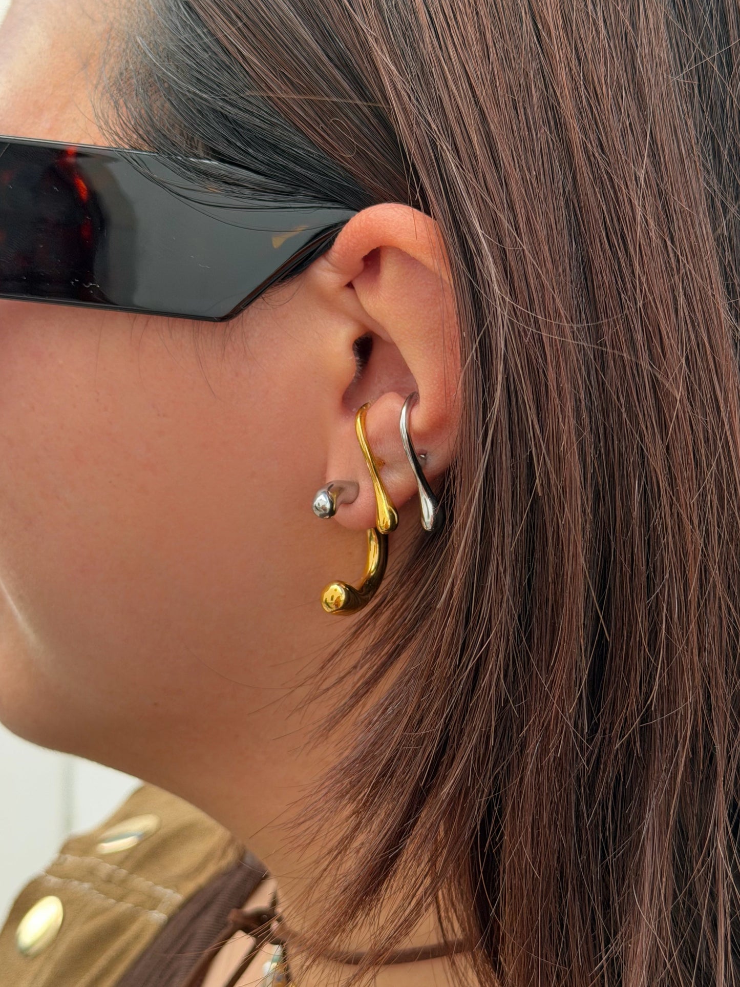 BRINCOS HALF CURVE EM AÇO INOXIDÁVEL