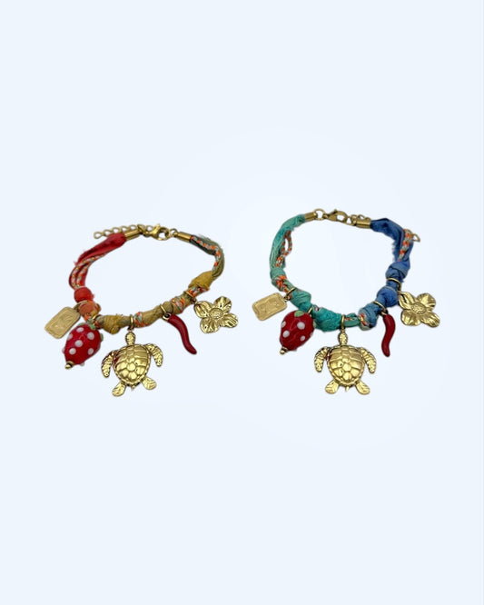 PULSEIRA BOHO COM TARTARUGA, FLOR E MORANGO EM AÇO