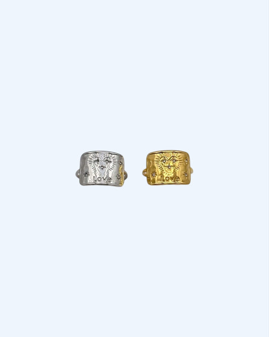 ANEL CORAÇÃO LOVE DOURADO OU PRATEADO em aço