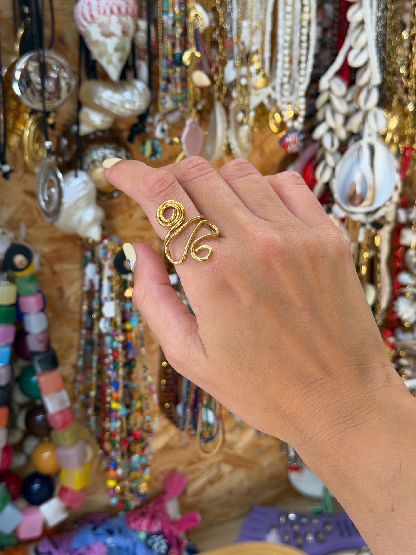 ANEL MOVIMENTO ESPIRAL DOURADO AJUSTÁVEL