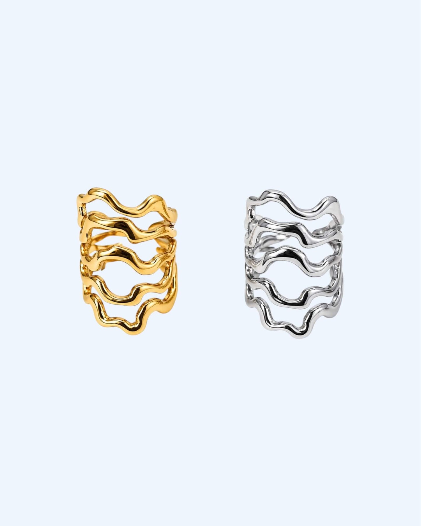 CHUNKY LONG RING WITH ABSTRACT LINES IN STAINLESS STEEL