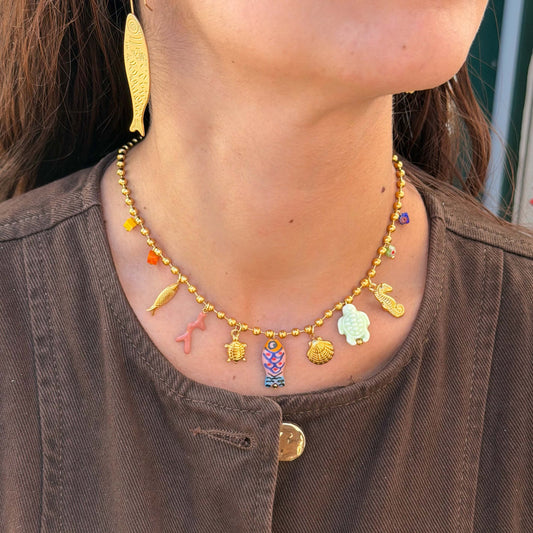 GOLD NECKLACE WITH SEA PENDANTS IN STAINLESS STEEL