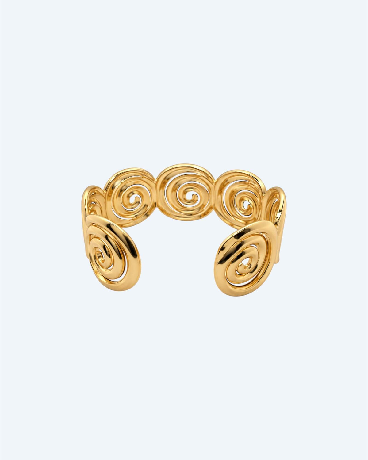 Vista de trás da Pulseira dourada rígida mas ajustável em aço inoxidável, composta por espirais recortadas e acabamento polido. Esta pulseira é ideal para looks boho ou urbanos, também para mais artisticos e de quem pretende ser simples com um detalhe ou para quem pretende juntar a um estilo bold. 